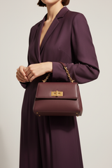 Sculpted Mini Designer Bag in Royal Mulberry Plum – Female Model