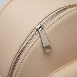 Creamstone Drift — Leather & Zipper Close-up