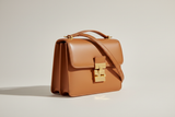 Classic City Shoulder Bag in Camel Tan, side angle view