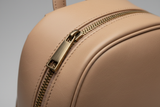 Contemporary City Backpack in Soft Almond Beige, leather and zipper close-up