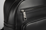 Contemporary City Backpack in Obsidian Pearl Black, leather and zipper close-up